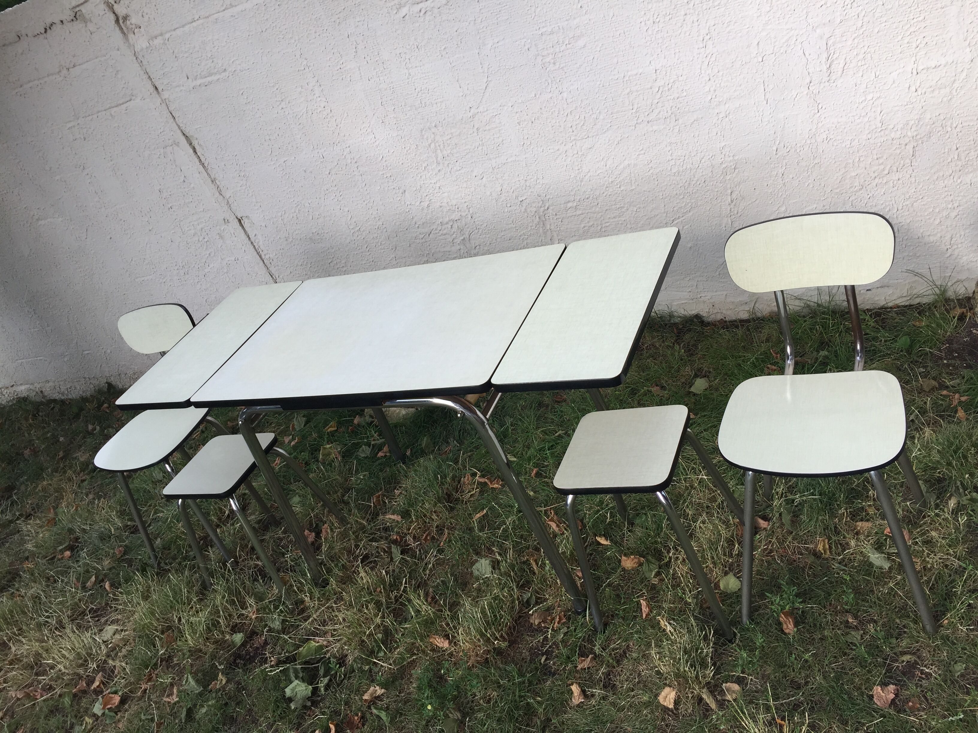 Table with 2 chairs anfd 2 stools