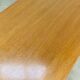 1950s modernist coffee table, wood and black metal.