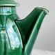Ceramic teapot, bright green.