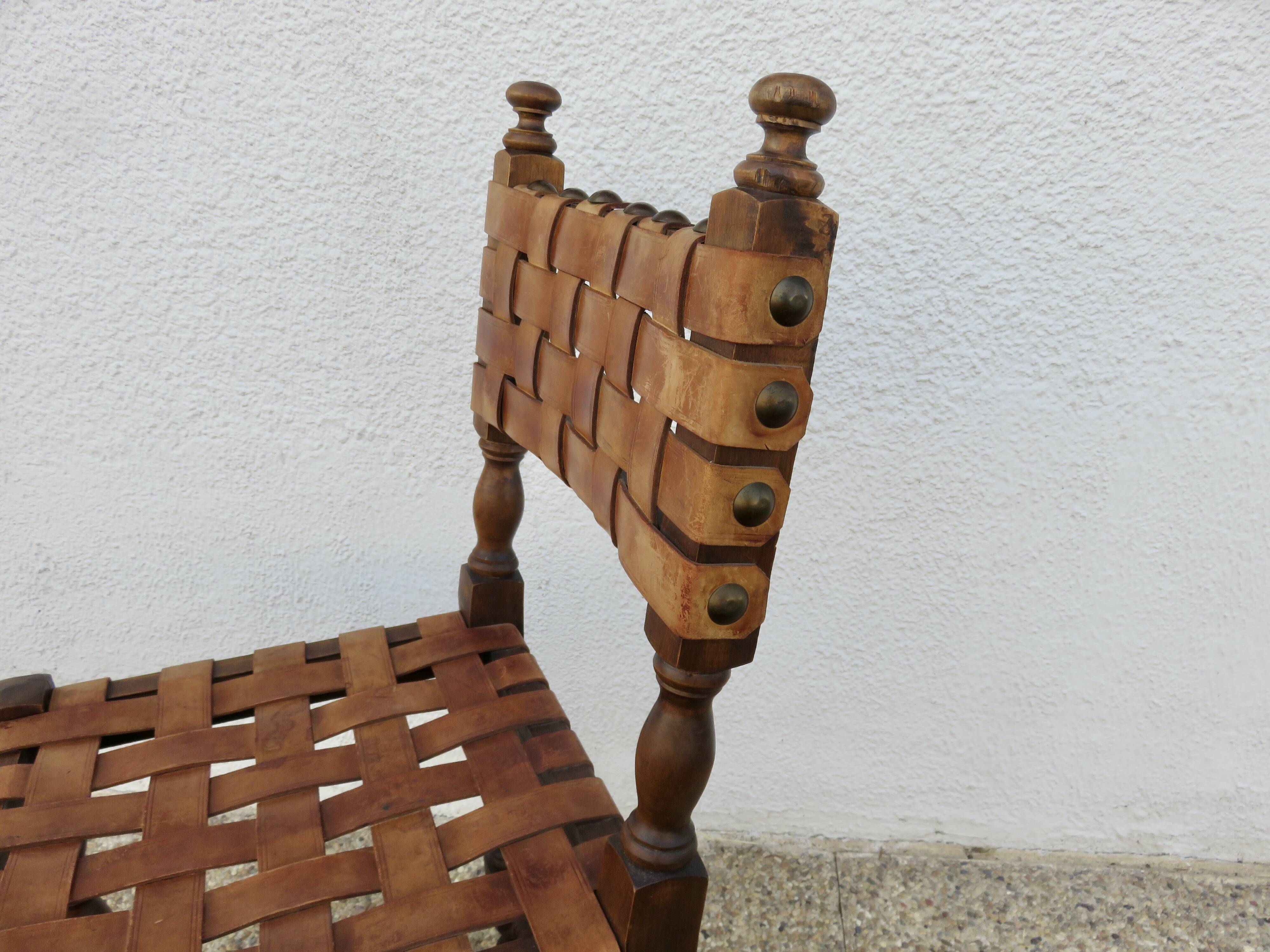 Spanish chair in oak with thick cognac leather straps, 1940s.