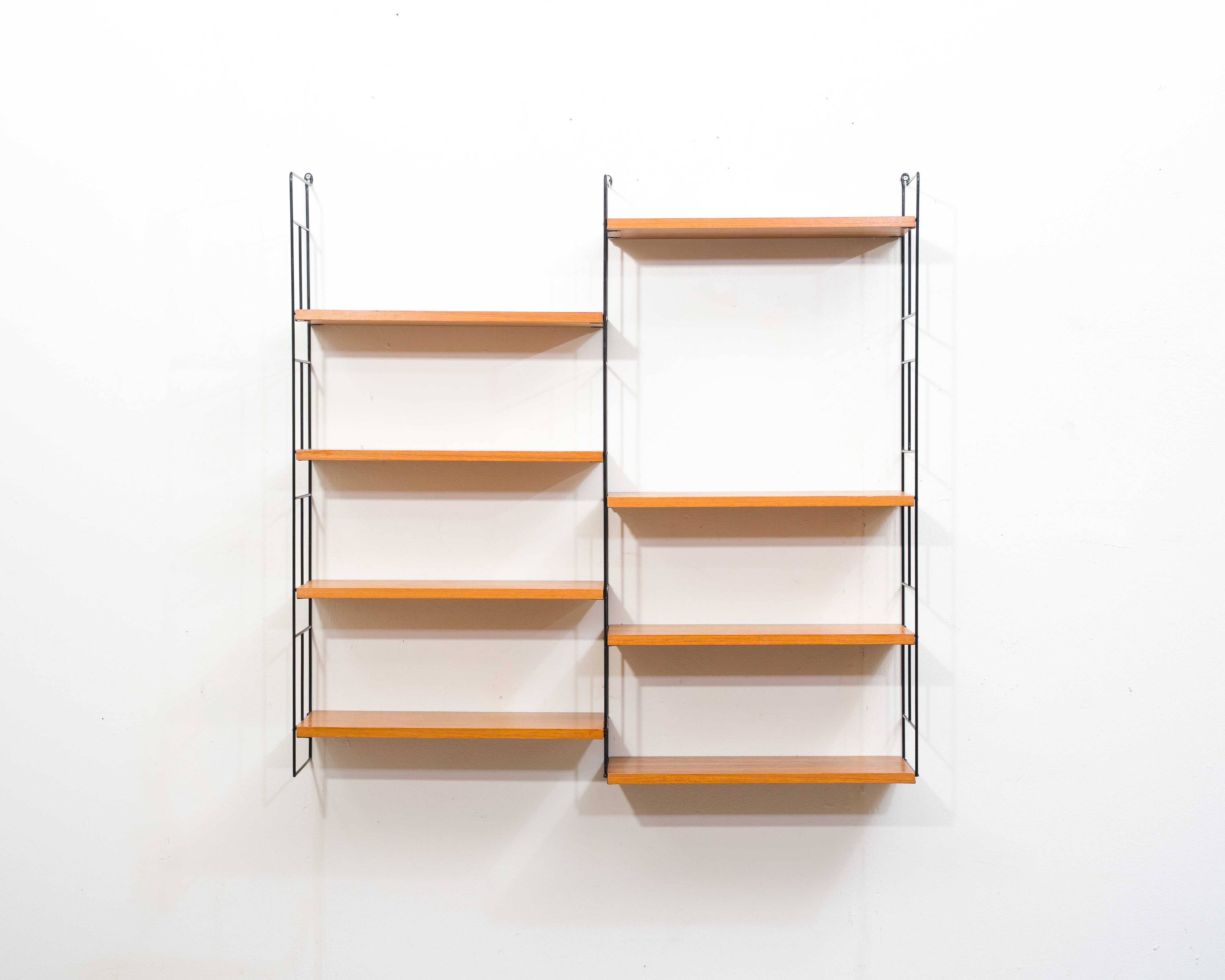 1960s teak wall shelf, manufacturer WHB, eight shelves