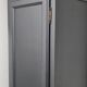 Man standing in wardrobe