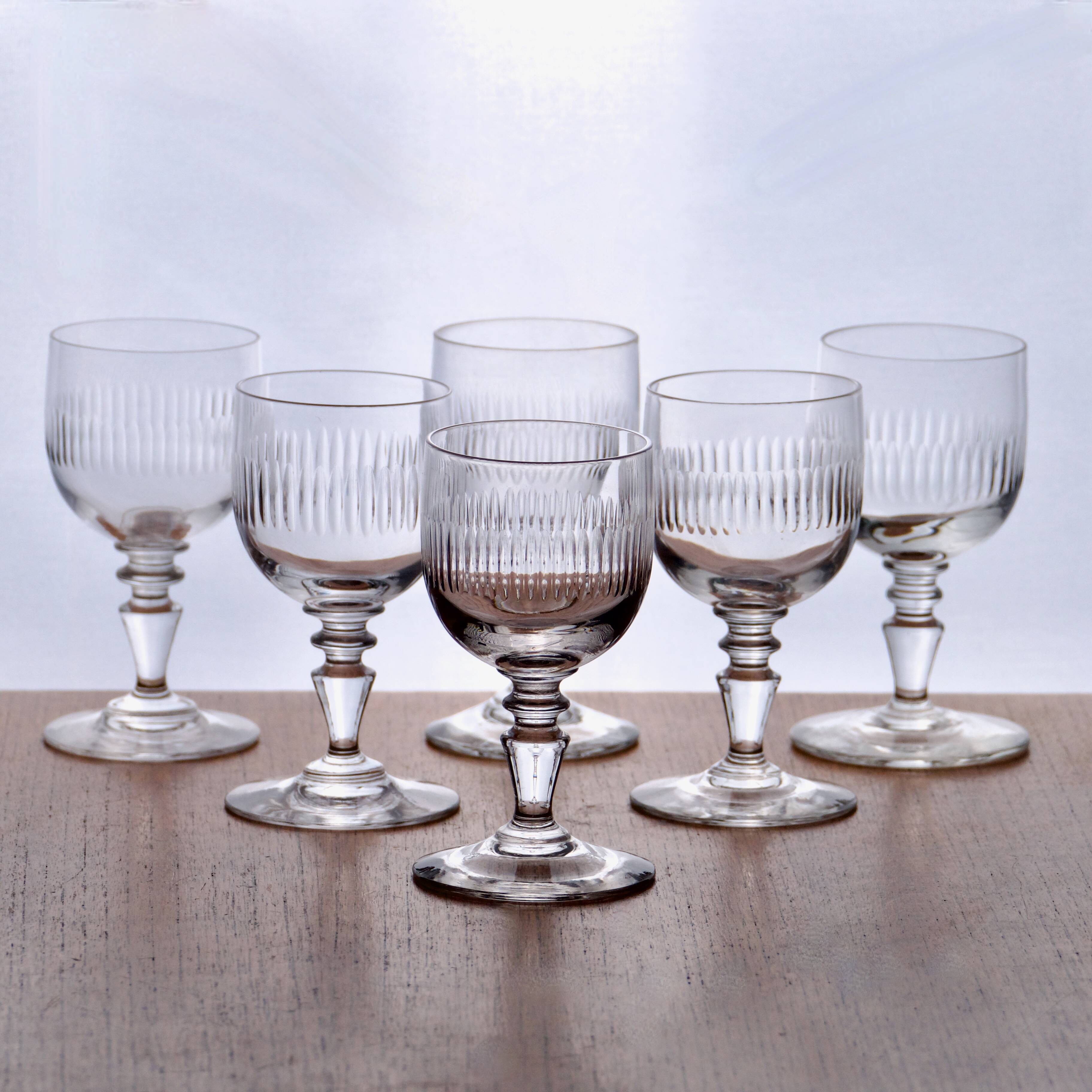 Antique 19th century mouth-blown glasses with gadroon carving