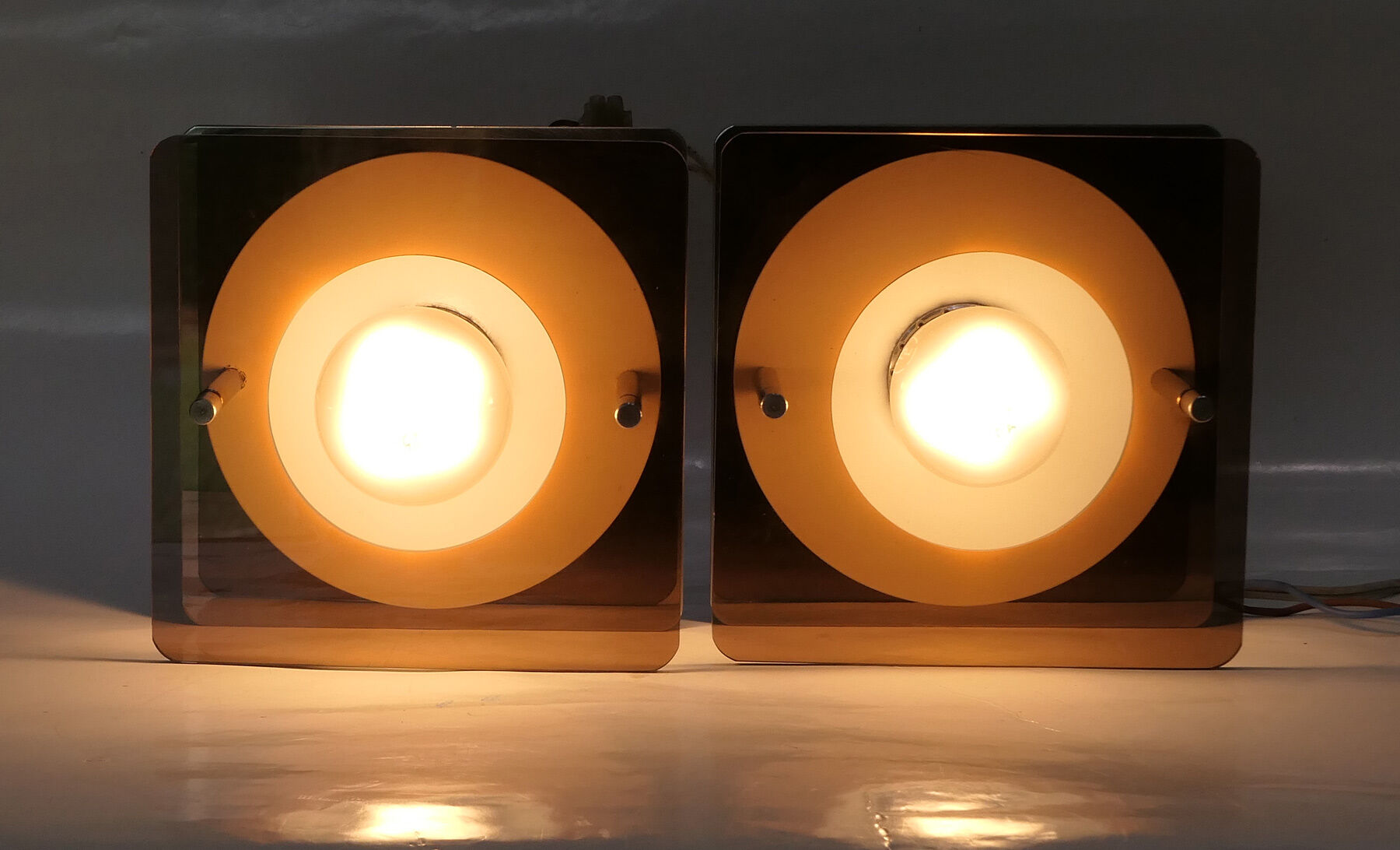 2 wall lamps metal and plexiglass of Jocelyne Trocmé for Oxar 1970
