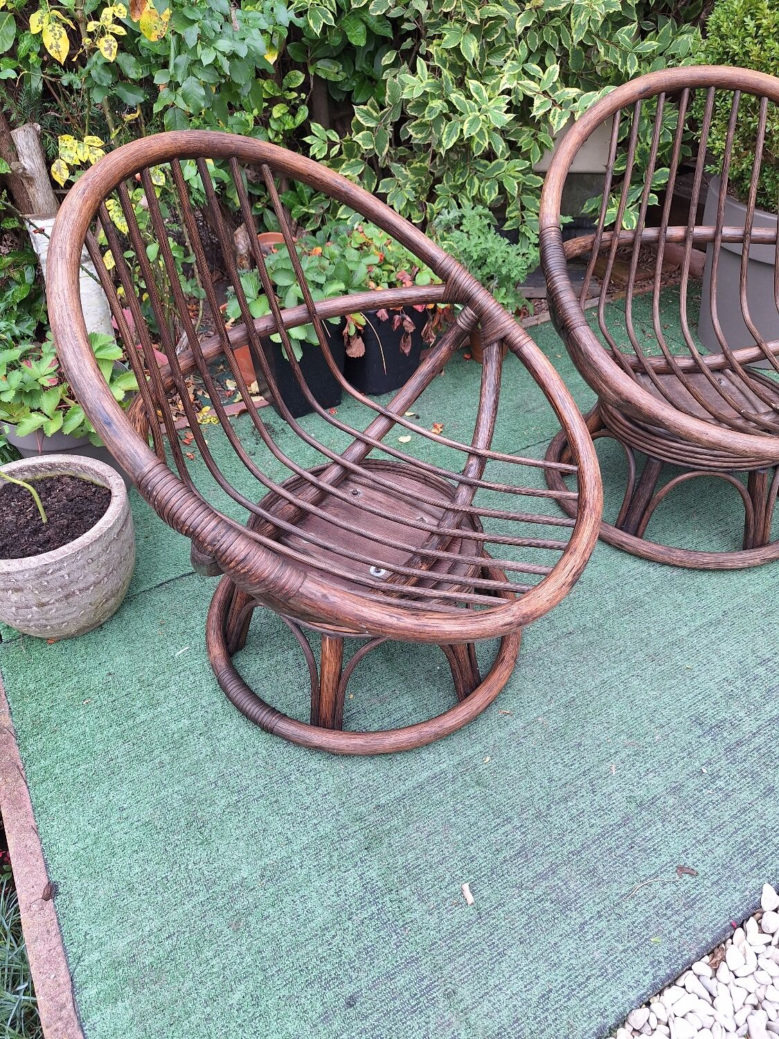 Pair of vintage rattan swivel armchairs