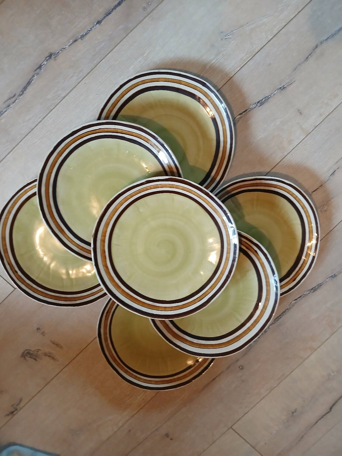 7 old stoneware flat plates