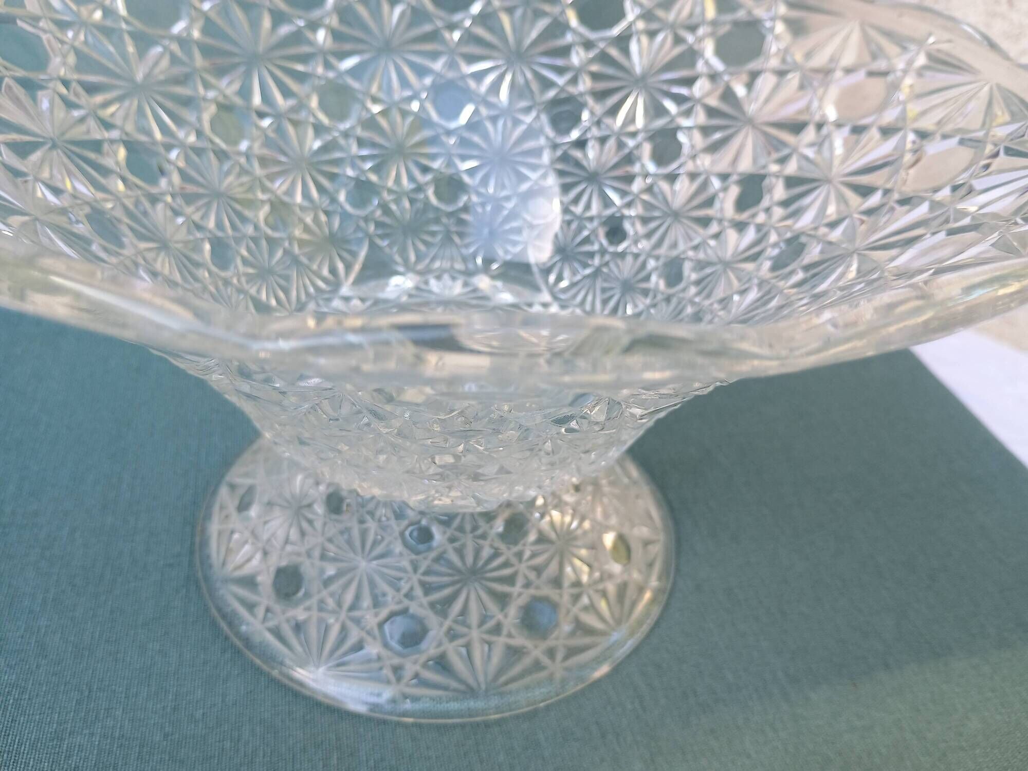 Flared fruit bowl with a pedestal, all made of pressed moulded glass, mid-20th century.