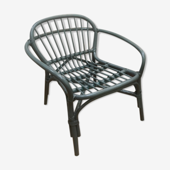 Grey rattan armchair