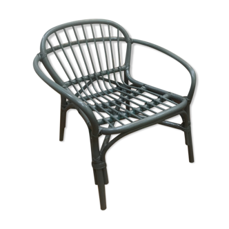 Grey rattan armchair