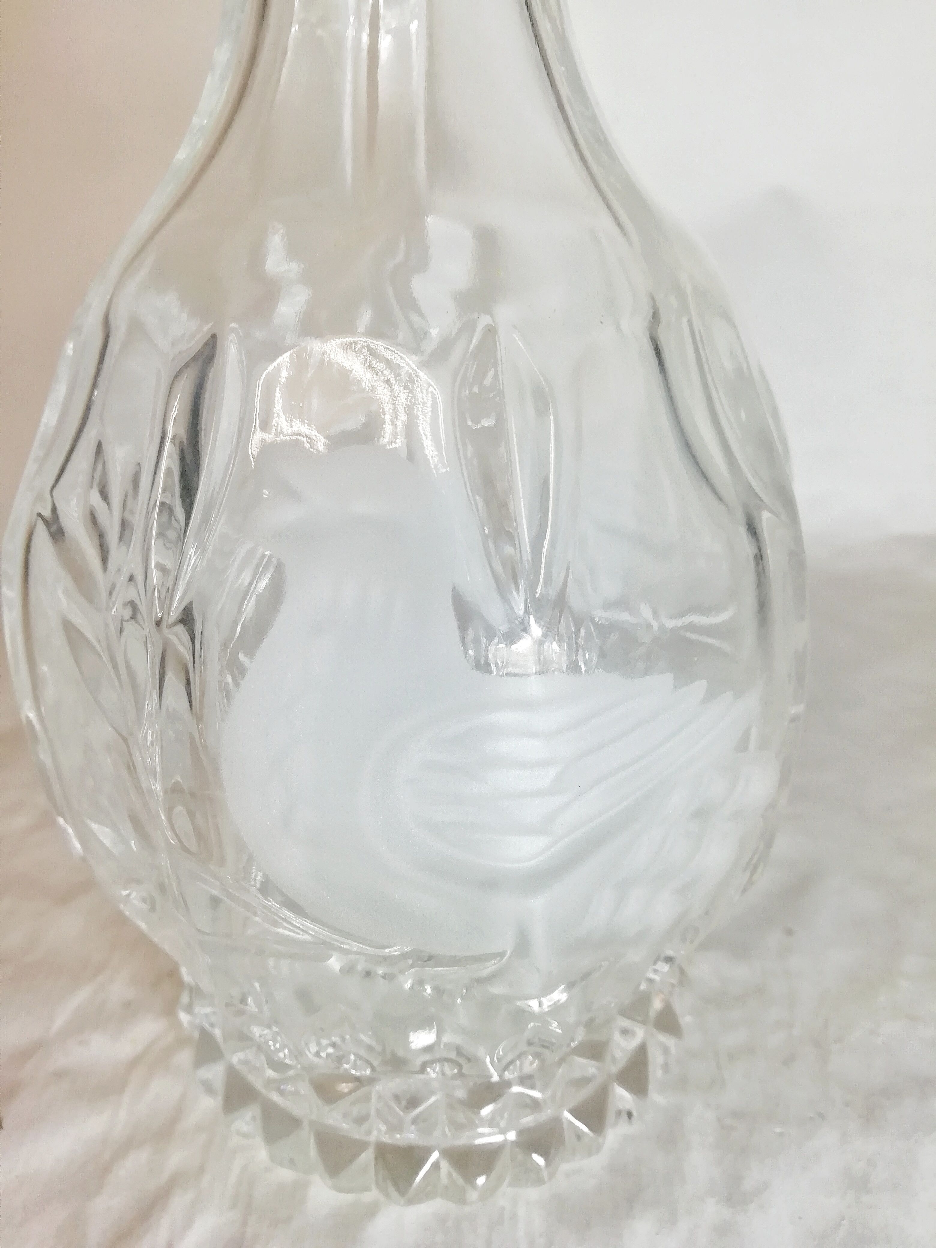 Carved glass bottle