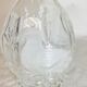 Carved glass bottle