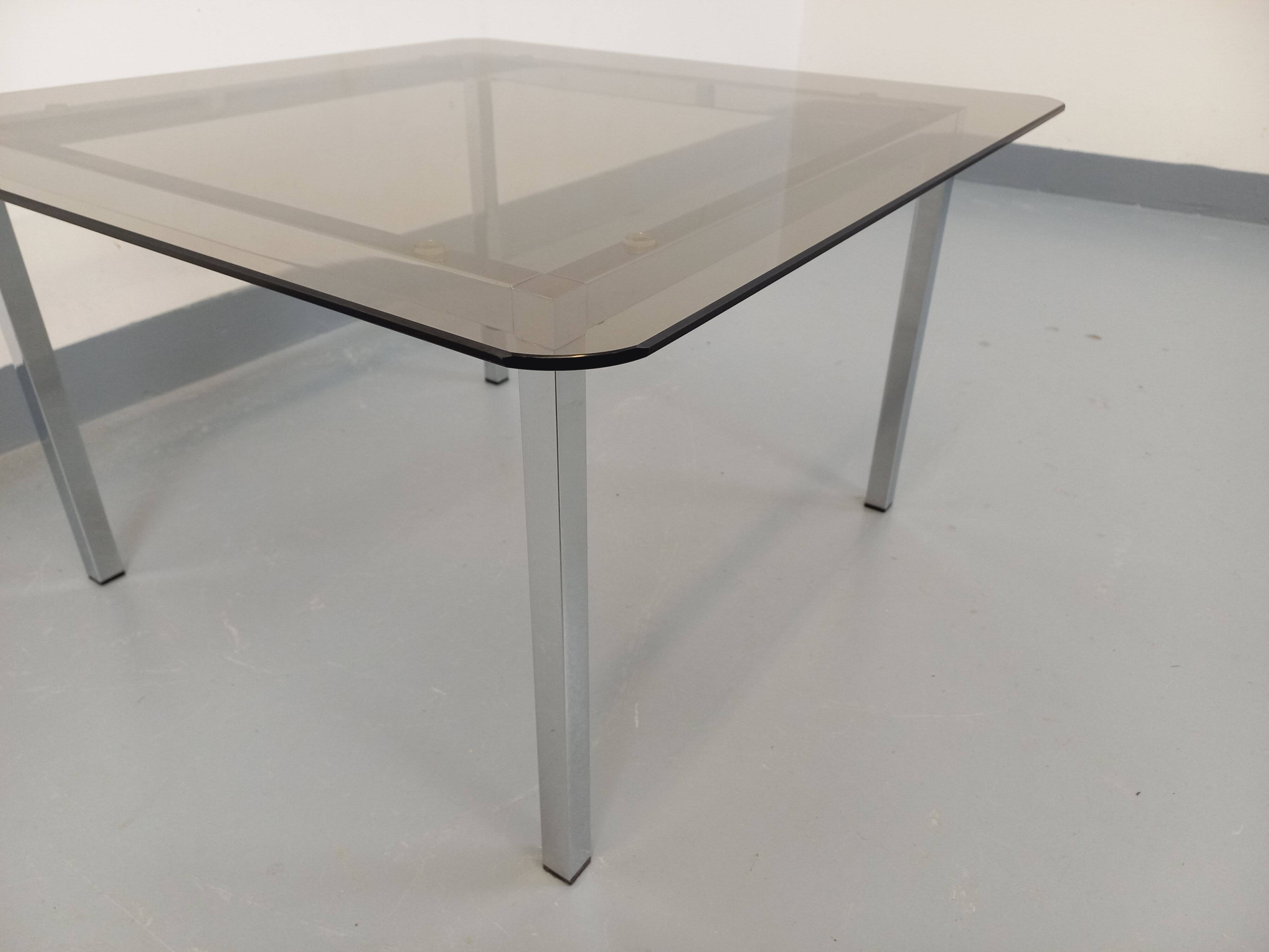 Vintage square coffee table in smoked glass and chrome metal from the 1970s.
