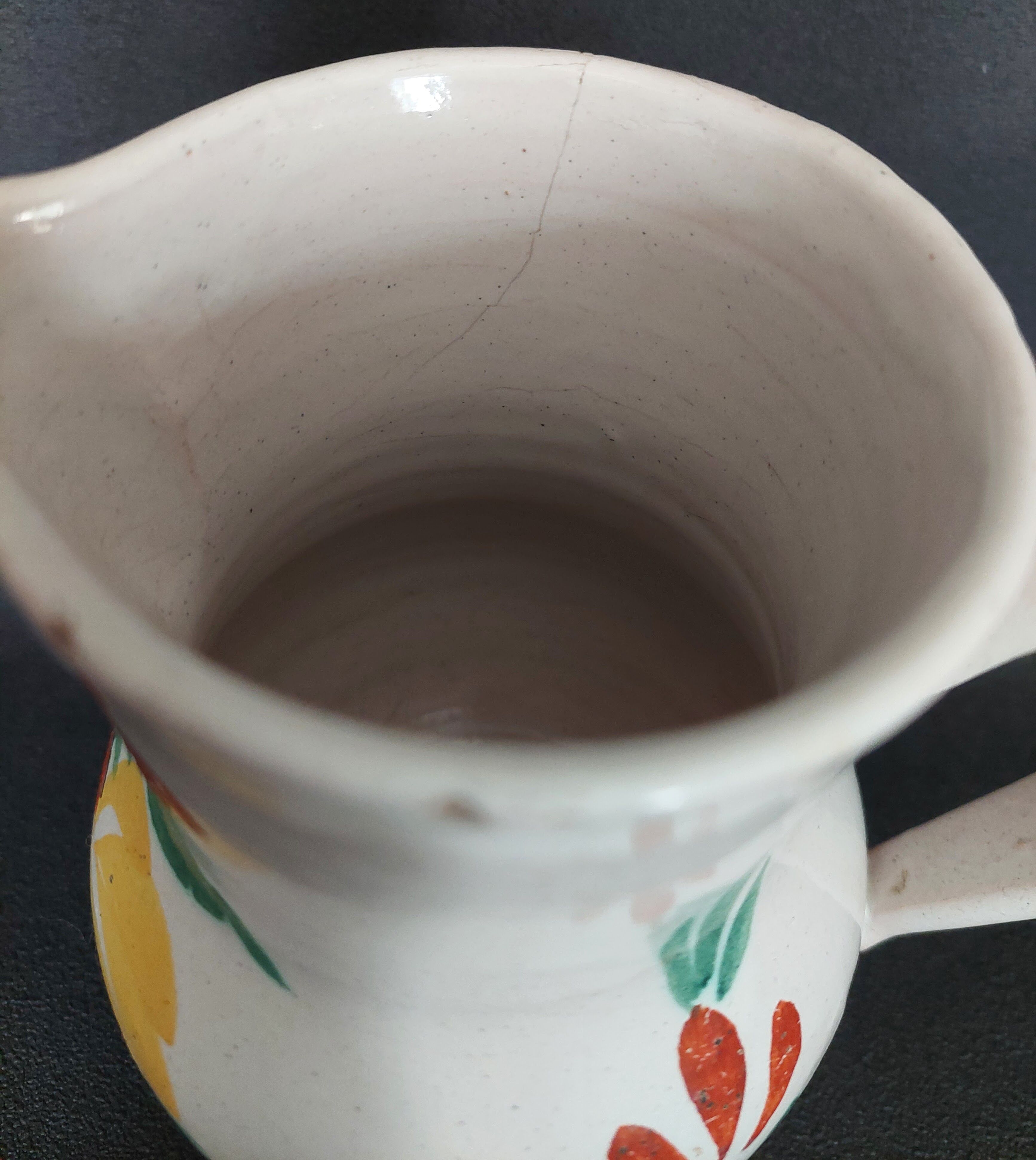 Earthenware pitcher from the late 19th century.