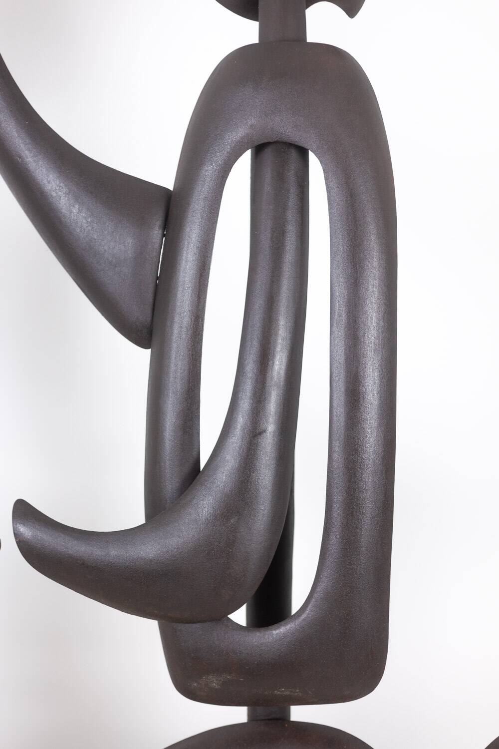 Antonine de Saint Pierre. Curved metal sculpture. Contemporary work.