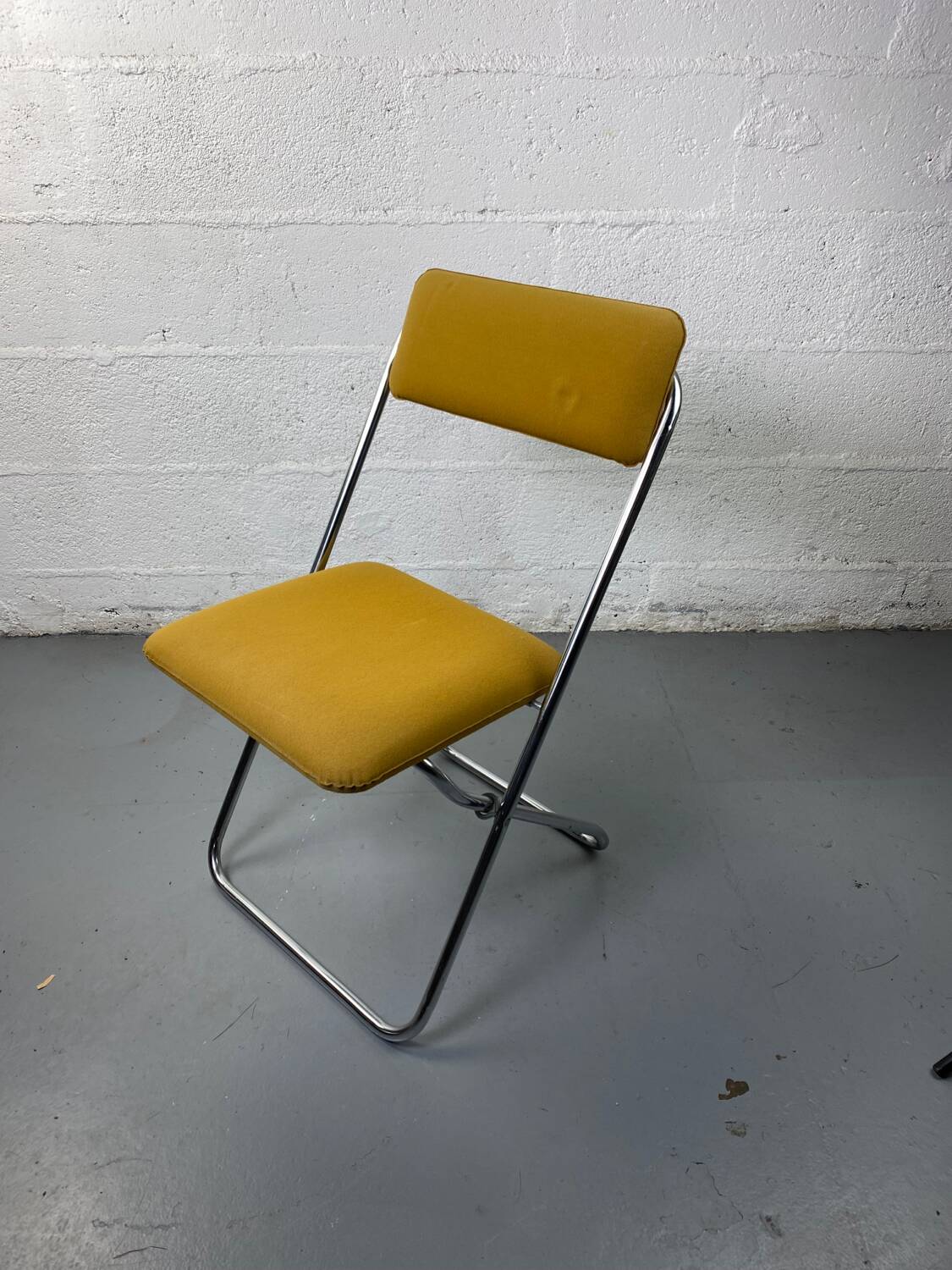 Mustard yellow folding chair