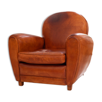 Club armchair in light brown leather