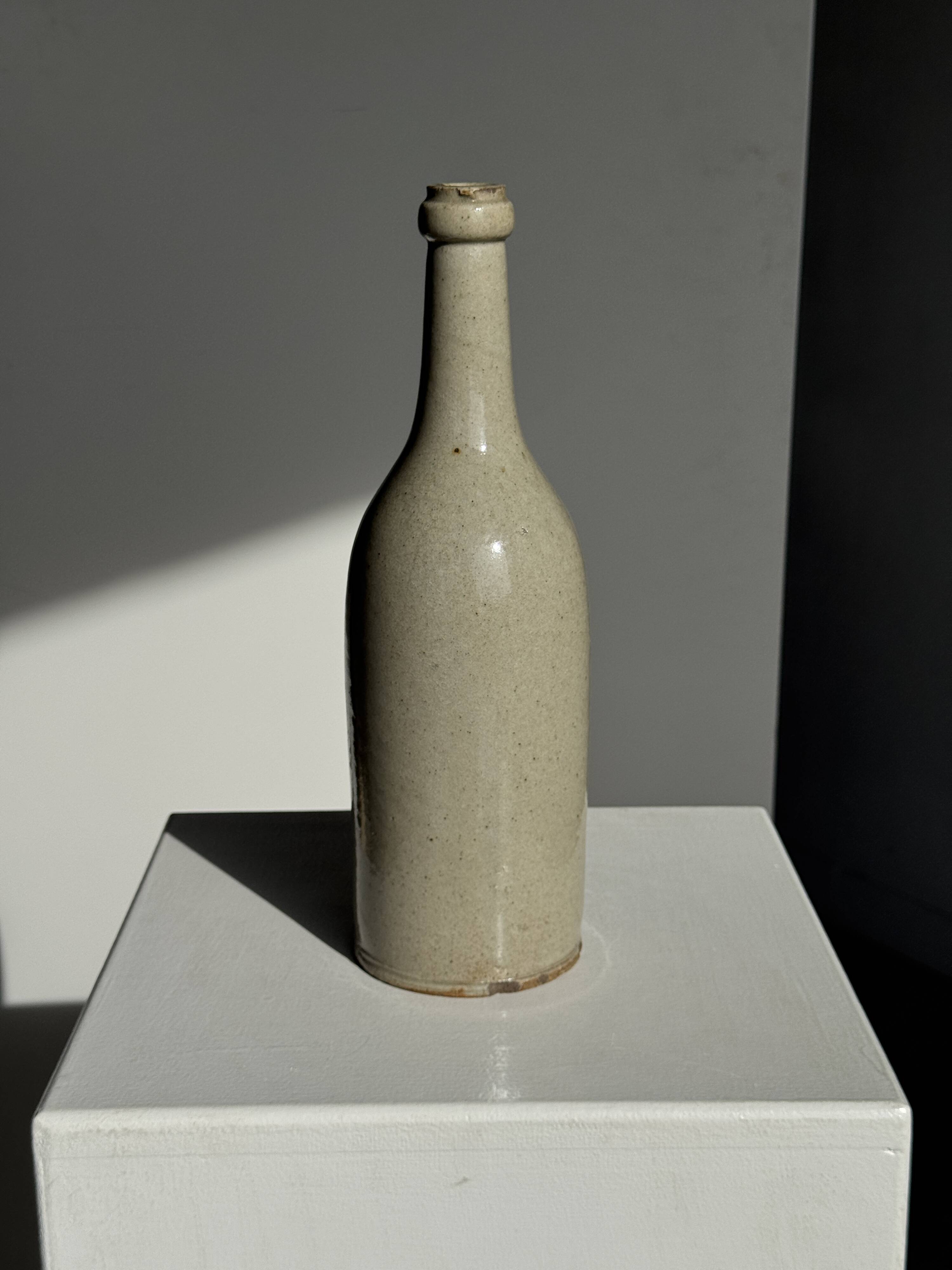 Bouteille vintage en grès beige moucheté H31