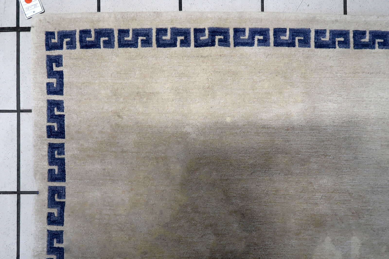 Vintage handmade 4.8' x 6.1' (147 cm x 187 cm) Tibetan Khaden rug from the 1970s