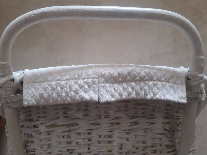 Wicker and painted wood baby cradle