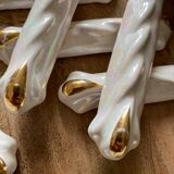 Set of 9 vintage art deco knife holders in pearly and gold ceramic