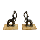 Pair of bookends in the shape of deer in cast iron.