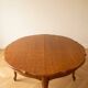 Round extendable oak dining table