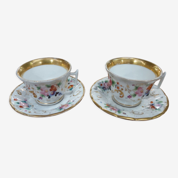 Duo porcelain cups and sub-cups Old Paris XIX th