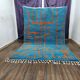 Large Moroccan rug made of natural wool, dimensions 250x150 cm, handmade.