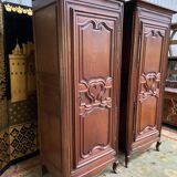 Pair of Louis XV style bonnetière in solid oak 19th century
