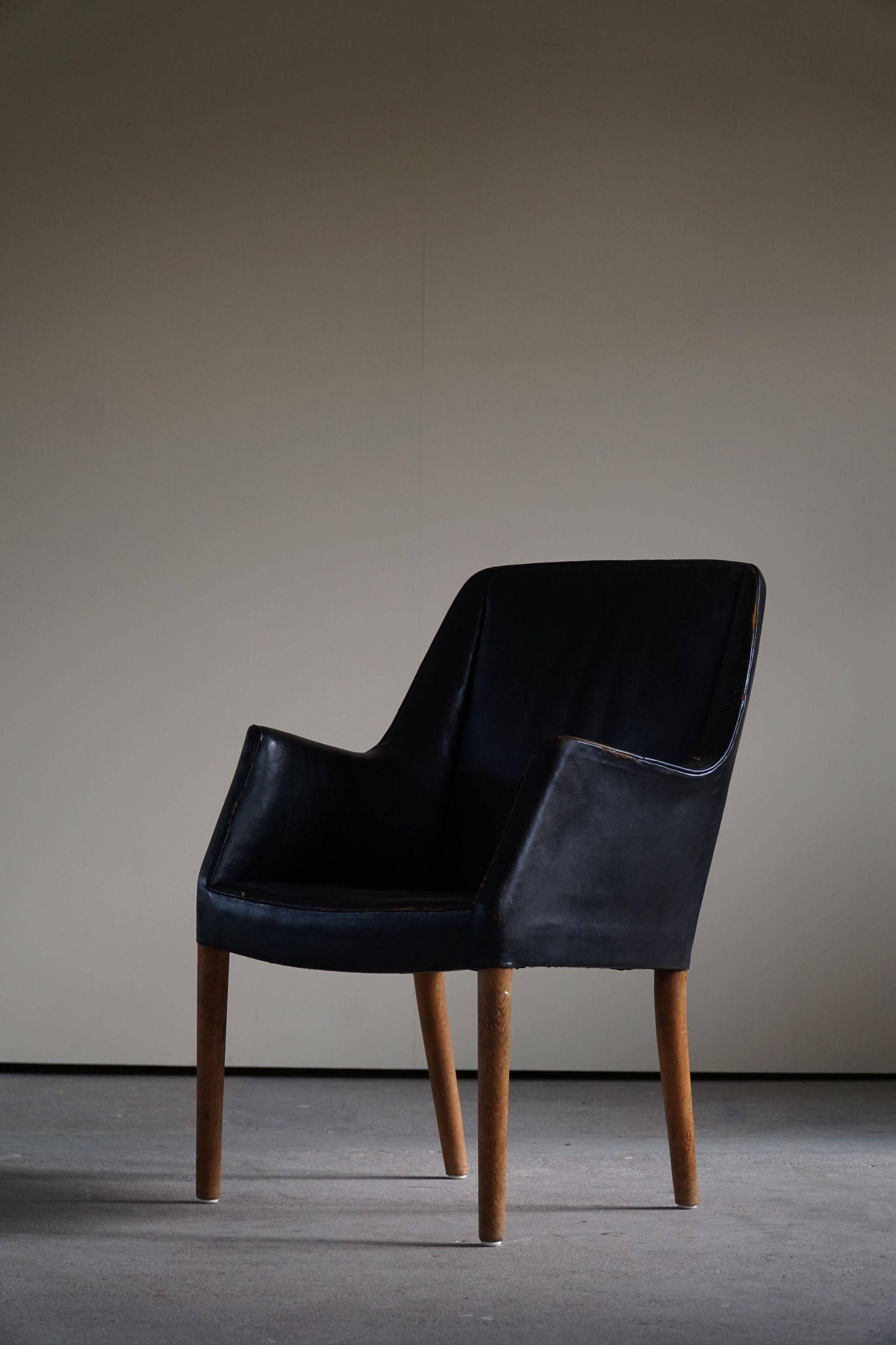 Fauteuil Danemark Moderne par Nanna Ditzel en chêne et cuir patiné, années 1950