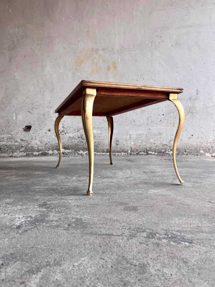 Mid-century wooden coffee table with golden metal legs and black-lined tabletop, 1950s
