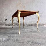 Mid-century wooden coffee table with golden metal legs and black-lined tabletop, 1950s