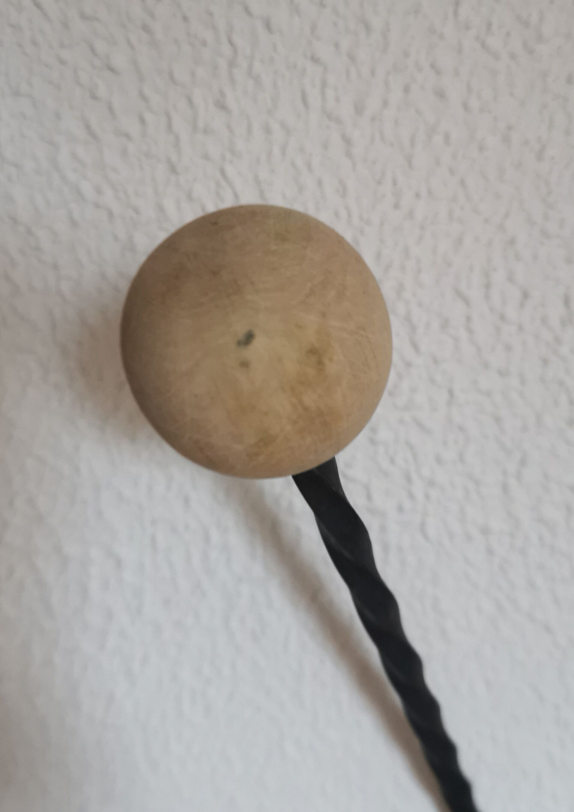 Wooden and iron wall coat holder