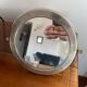 Vintage round mirror in silvered metal.