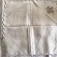 Grey silk nape and towels embroidered with coloured cashmere patterns