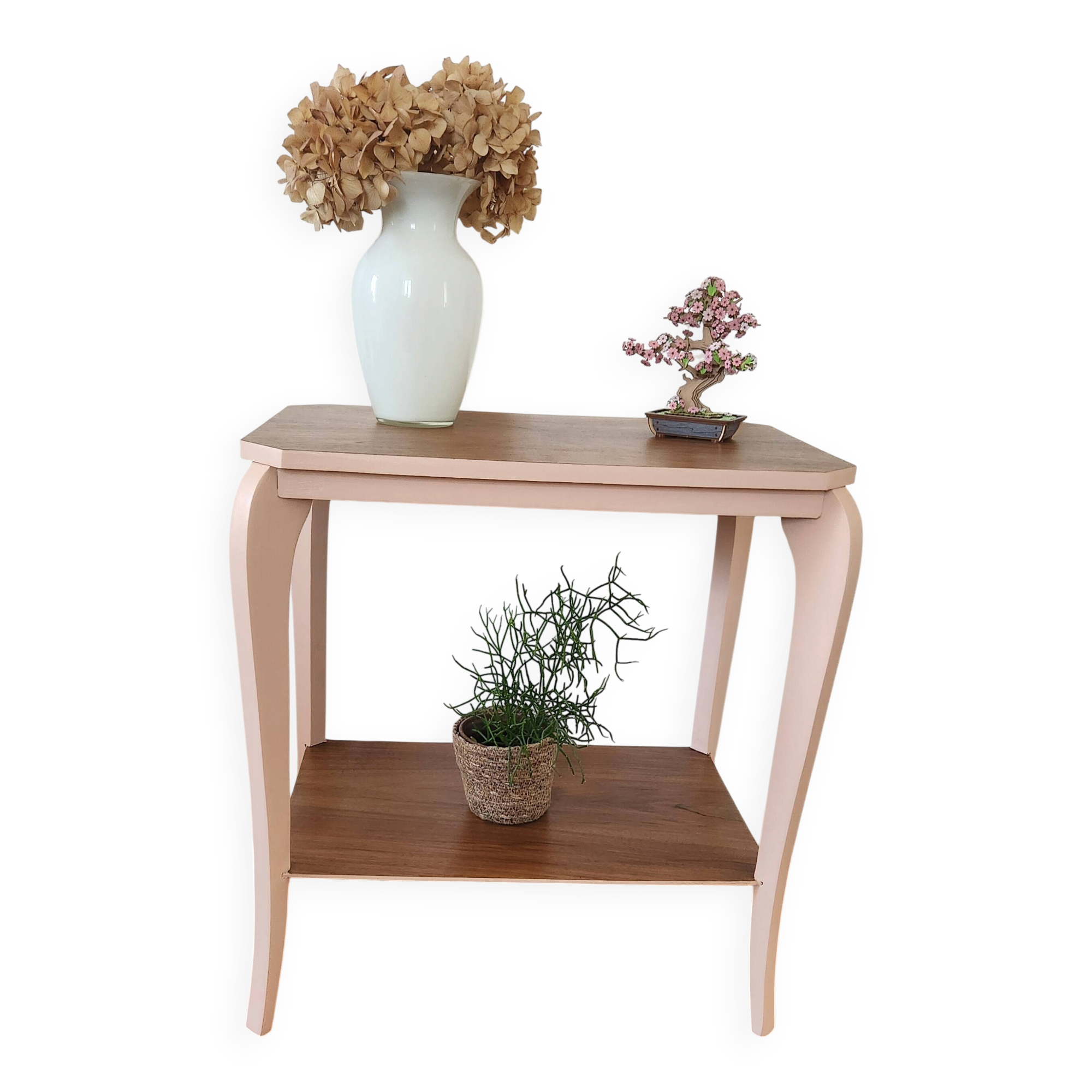 Side table with curved pink legs