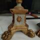 Pair of antique candlesticks in carved wood with acanthus leaf decoration