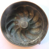 Old copper cake pan, braided crown, kitchen utensil