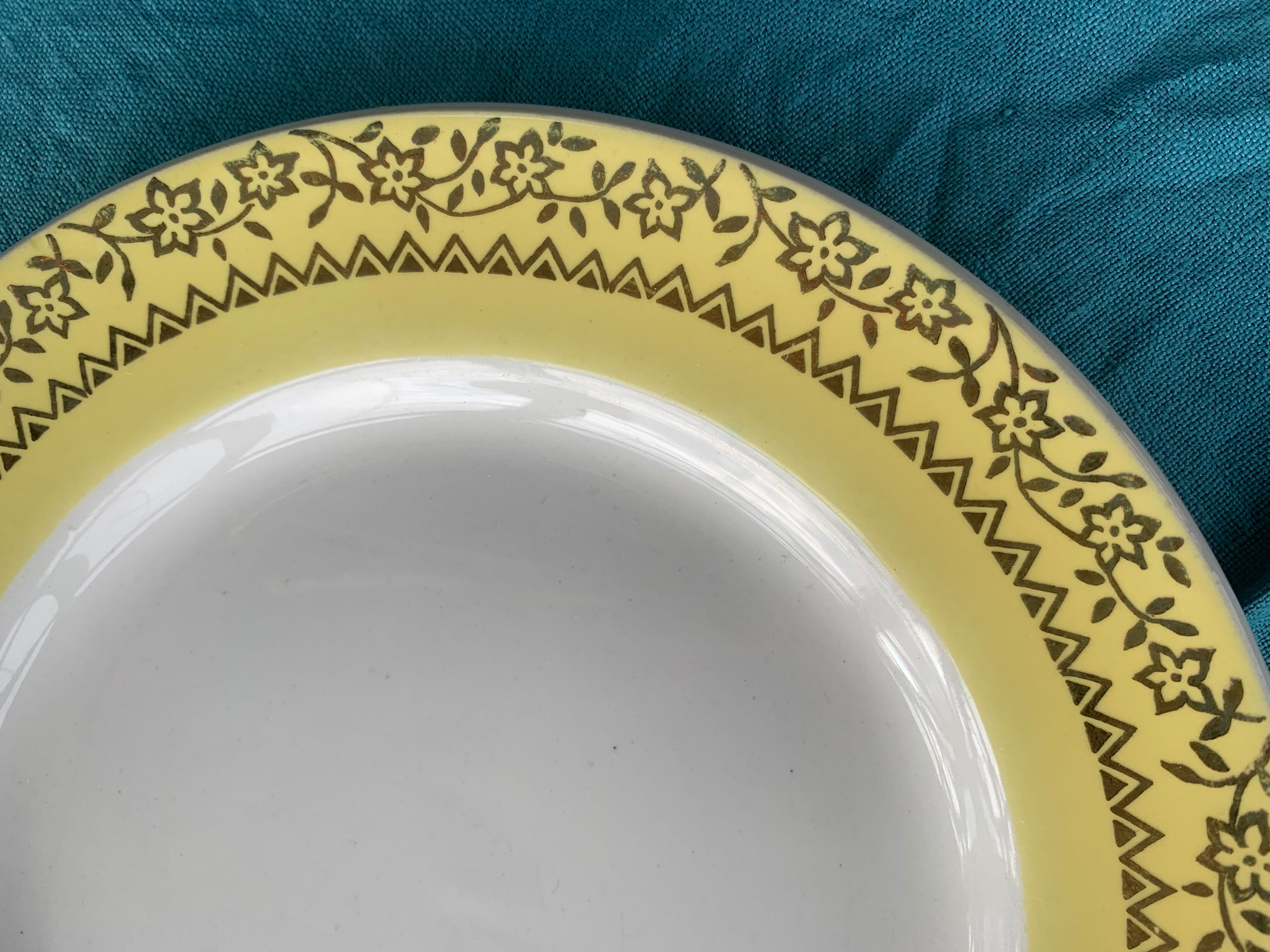 6 small plates with yellow borders and floral pattern gold antiques