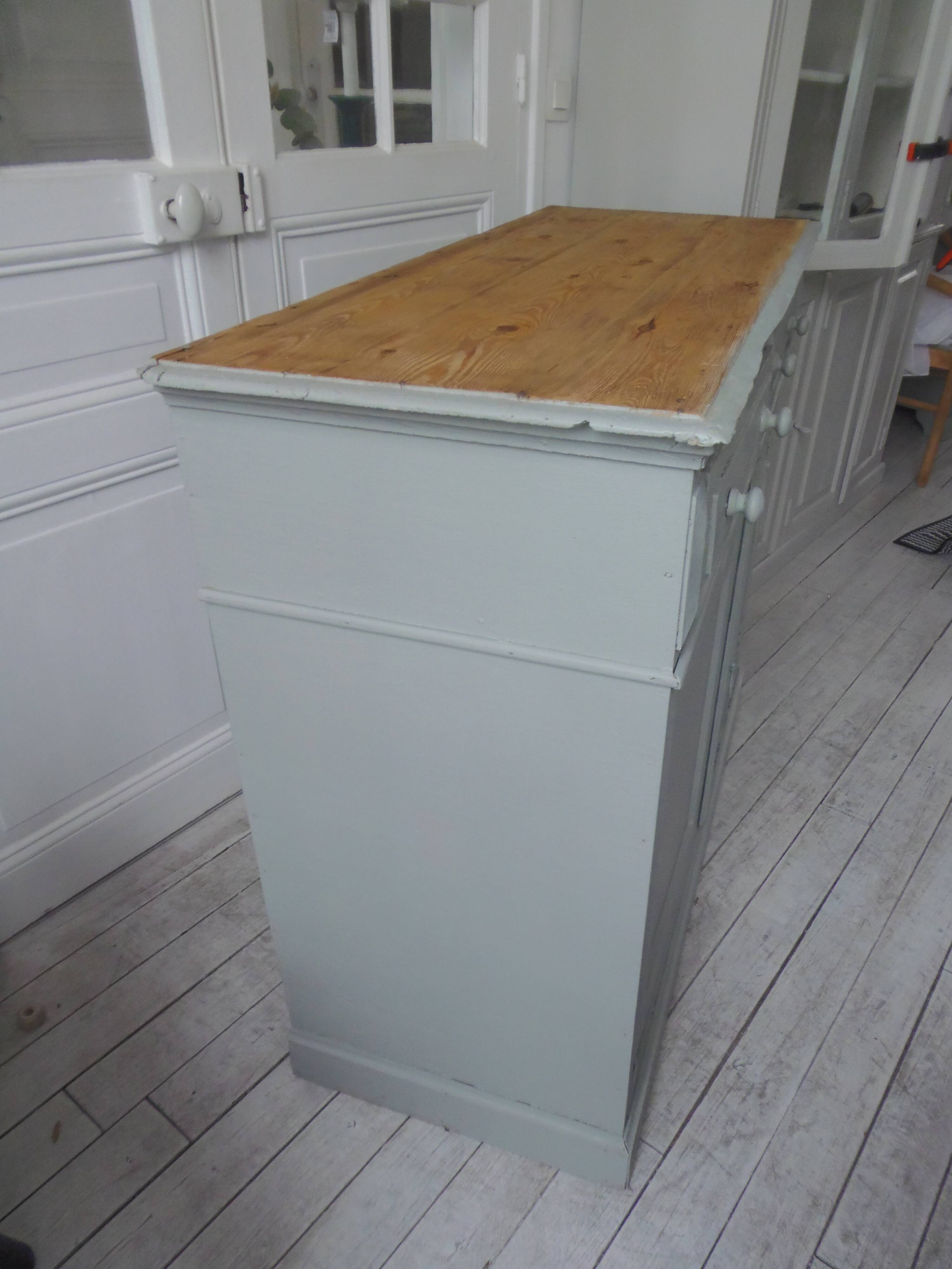 Antique sideboard enhanced in verdigris, wooden top.
