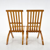 Ensemble de deux chaises pliantes en hêtre, conçues par l'architecte Otto Rothmayer.