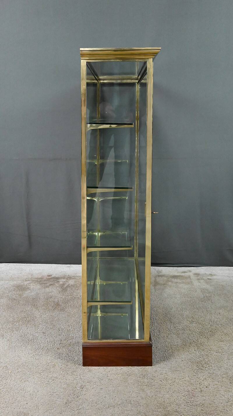 Brass display cabinet with a mirrored back – early 20th century
