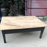 Wooden coffee table with a drawer