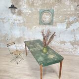 Vintage farm table with spindle legs.