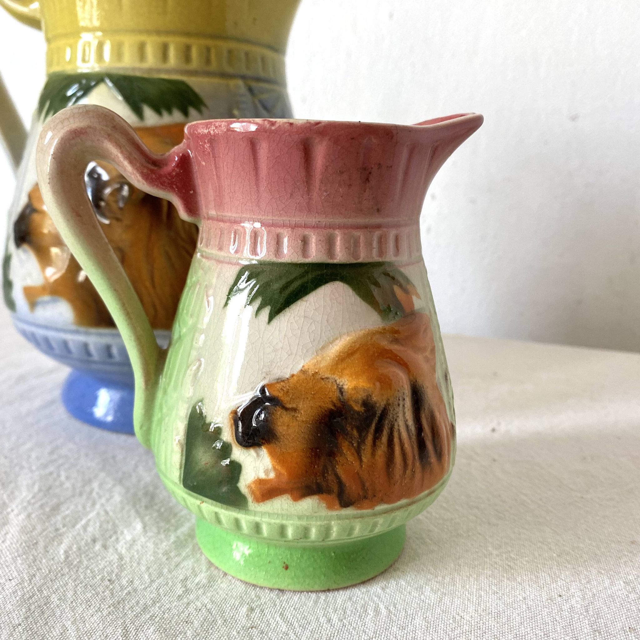 Art Deco pitchers in assorted barbotine lion Poët Laval