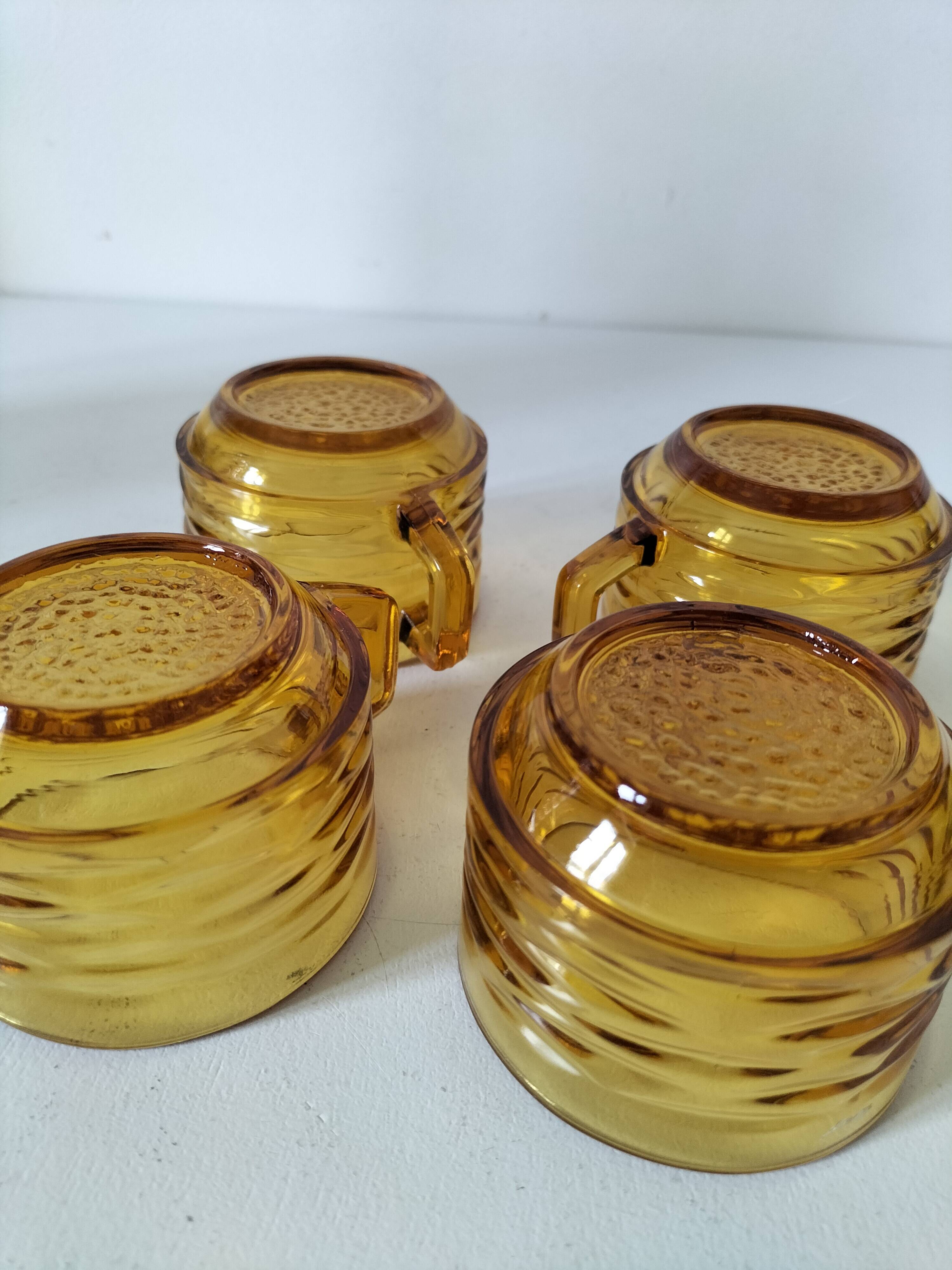 Set of 4 vintage amber glass mugs with textured 70s design