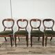 Four solid wood chairs with fabric seats, late 19th century