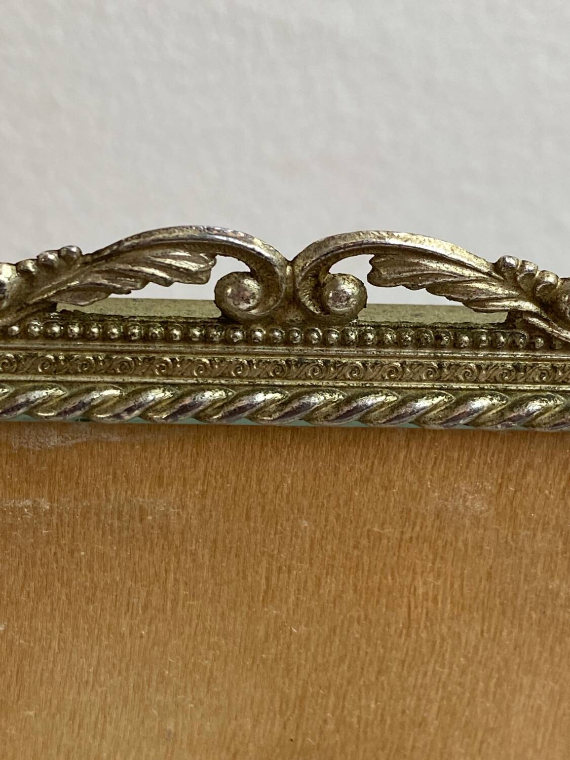 Italian gold metal frame on stand