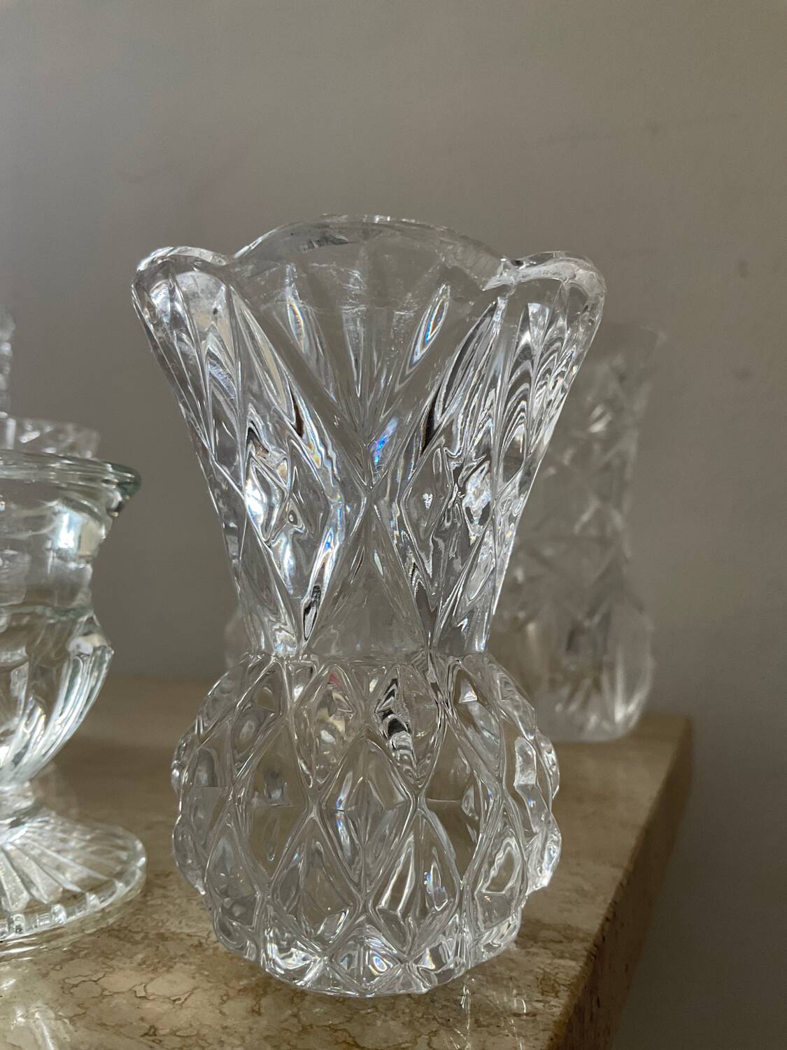 Series of 6 miniature vases in chiseled glass