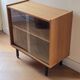 Low buffet or wooden display cabinet with sliding door - 1950s design